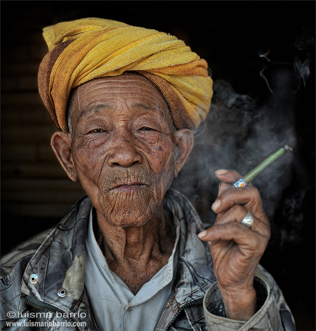 portrait smoker inle lake myanmar burma
